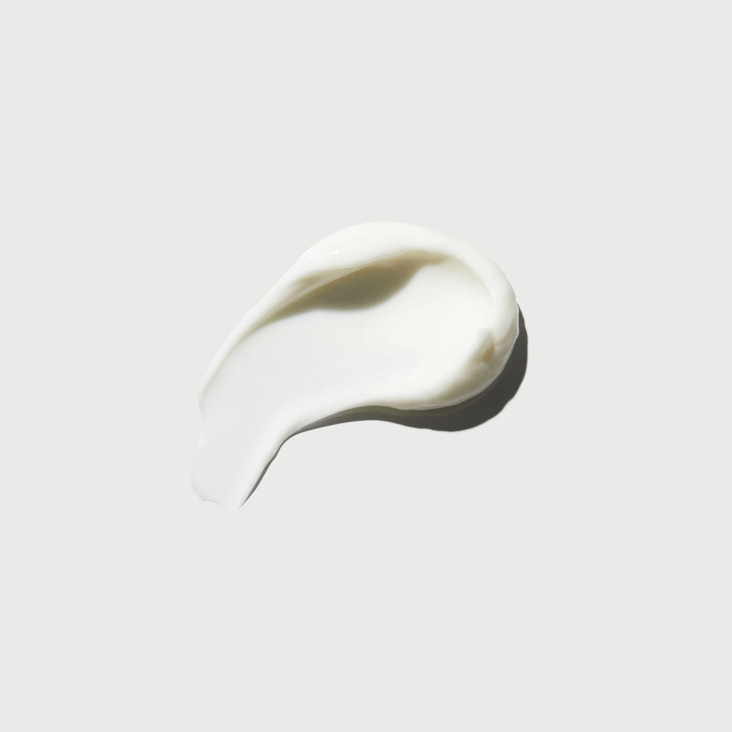 the-smoother-glycolic-acid-body-lotion-l3 NATR-40014-Swatch-The-Smoother-Glycolic-Acid-Body-Lotion-bonebkgd.jpg