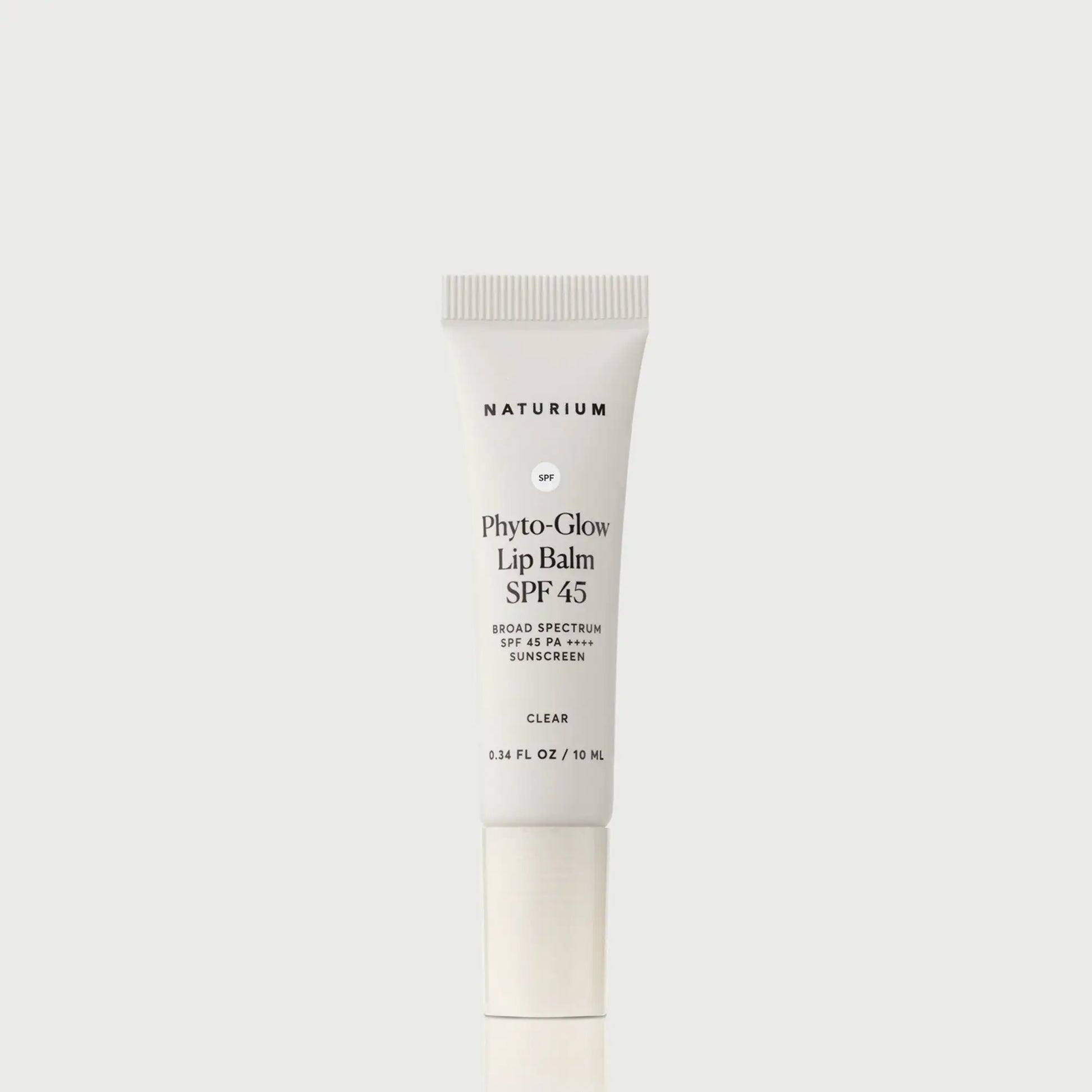 phyto-glow-lip-balm-spf-45-clear-s8 NATR-10124_PhytoGlow_SPF_Clear_primary_capon_front_bonebkgd_1.webp
