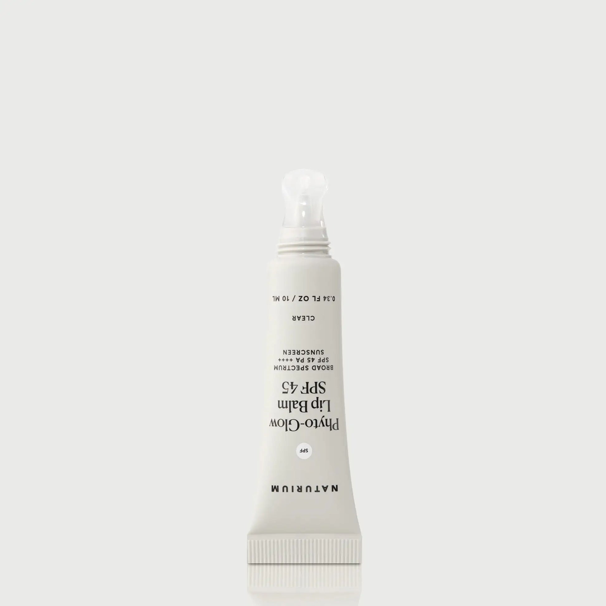 phyto-glow-lip-balm-spf-45-clear-s8 NATR-10124_PhytoGlow_SPF_Clear_primary_nocap_bonebkgd_1.webp