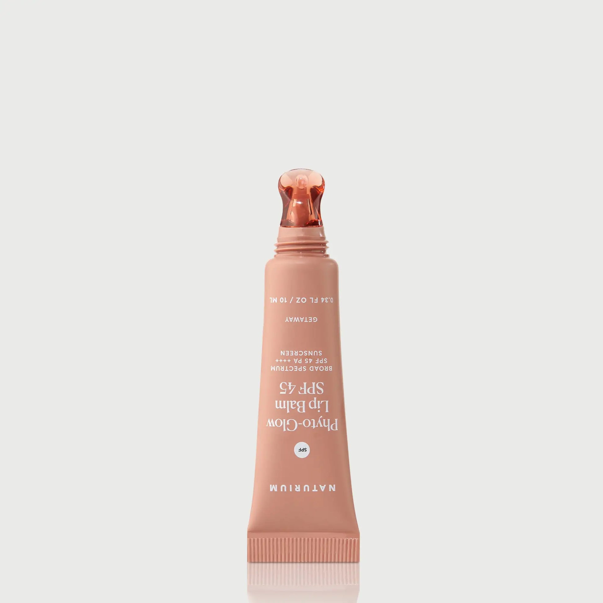 phyto-glow-lip-balm-spf-45-getaway-r3 NATR-10126_PhytoGlow_SPF_Getaway_primary_nocap_bonebkgd_1.webp