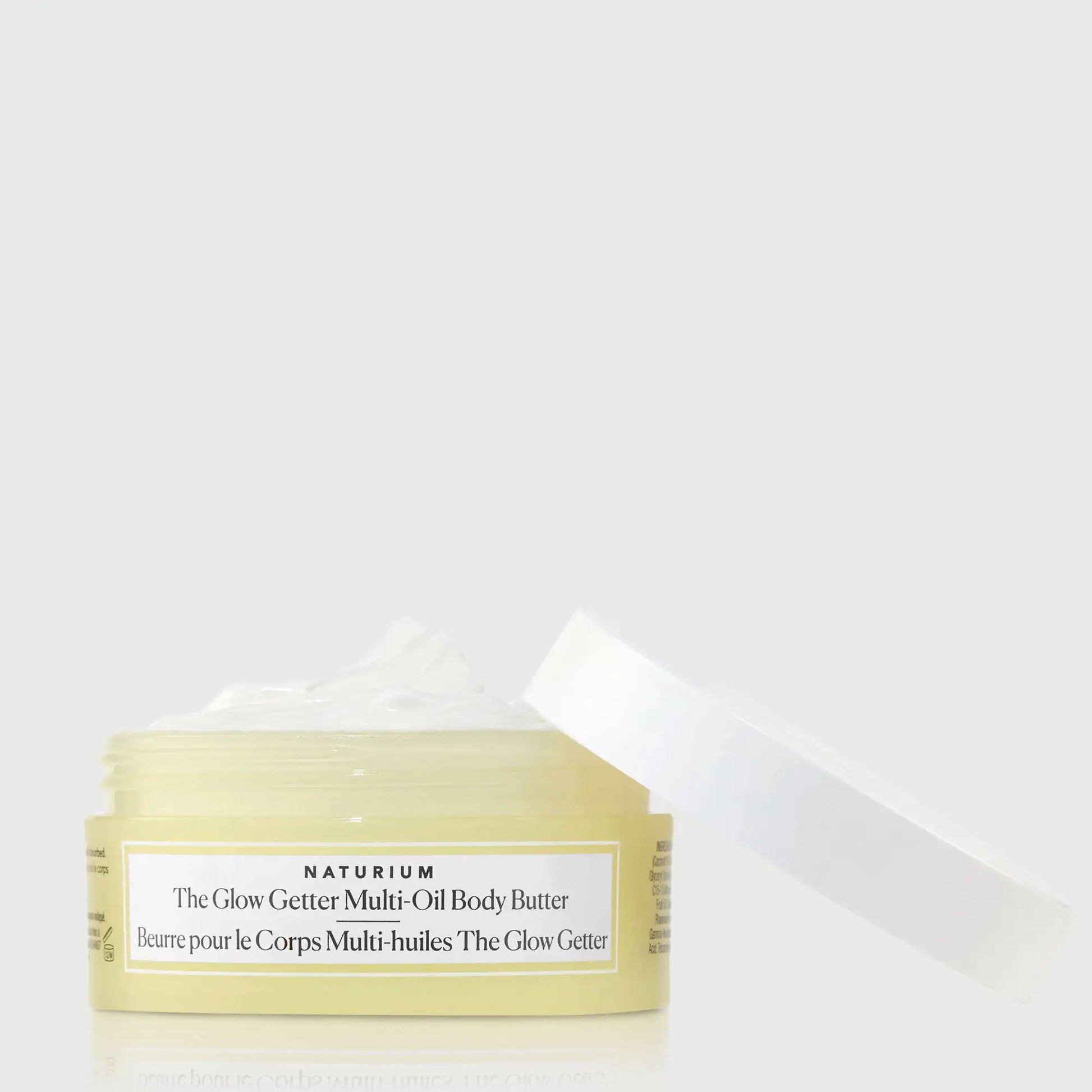 the-glow-getter-multi-oil-body-butter-travel-size-n6 NATR-40115_Glow-Getter-Body-Butter-Mini_front_capoff_bonebkgd.webp